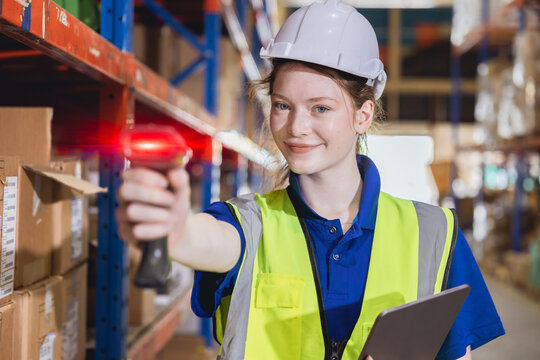 portrait happy young women warehouse worker working in products shipping storage cargo store