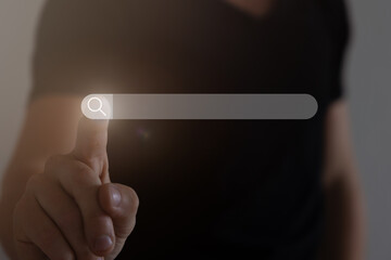 Searching Browsing Internet Data Information Networking Concept, Business man clicking internet search page on computer touch screen,copy space.