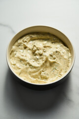 Classic Tartar Sauce dip in the bowl. Mayonnaise with dill and capers plus lemon, shallot onion. Worcester sauce and Dijon Mustard. 