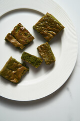 Matcha brownies. Twist on classic brownies recipe made with matcha powder and white chocolate. Moist and soft texture