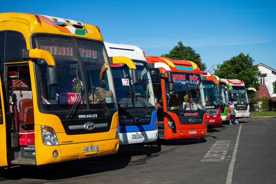 DALAT, VIETNAM - DECEMBER 28, 2015: Multicolored intercity buses at the Dalat Bus Station