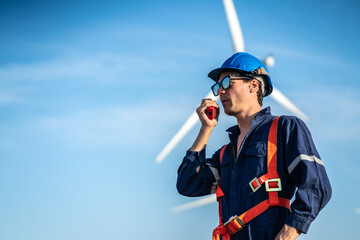 Green ecological power energy generation wind sustainable energy concept, Engineer wearing uniform...