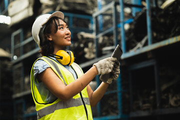 Happy women worker engineer technician employee working dirty workplace. Inventory manager staff in...