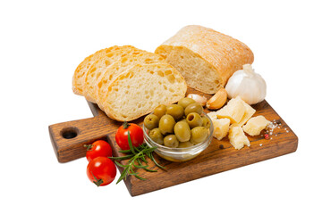Bruschetta with olive oil, olives, pesto, garlic and parmesan isolated on white background. ciabatta bread with olive oil and spices. Delicacy. Delicious and healthy food. Vegan.