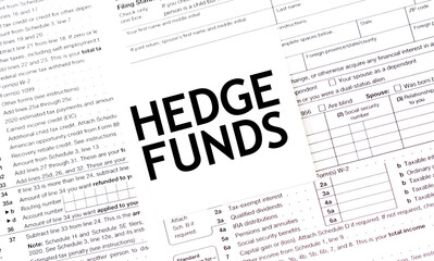 HEDGE FUNDS words on paper sheet with documents