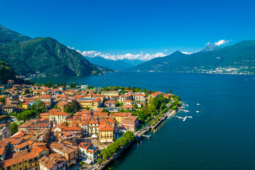Naklejka na ściany i meble Menaggio, Como Lake. Aerial panoramic view Menaggio town surrounded by mountains and located in Como Lake, Lombardy, Italy