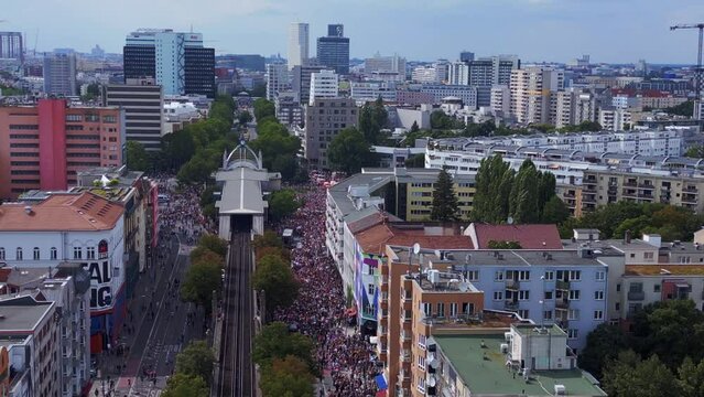Majestic aerial top view flight drone. CSD Pride Love Parade 2023 in city Berlin