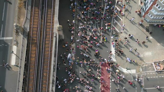 Majestic aerial top view flight drone. CSD Pride Love Parade 2023 in city Berlin