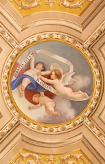 Foto op Canvas GENOVA, ITALY - MARCH 6, 2023: The ceiling fresco of  angels wih the marianic inscription in the church Chiesa di Santa Caterina by Oldoino Multedo from end of 19. cent.. © Renáta Sedmáková