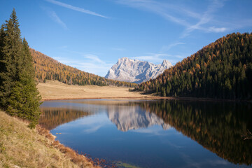 Obraz na płótnie Canvas Alpine lake with dolomites in background, Calaita lake