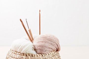 Craft knitting hobby background with yarn in natural colors. Recomforting hobby to reduce stress...