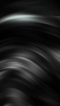 Abstract black and white blurred line gradient pattern loop vertical background.