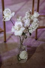 Vase with beautiful roses on the floor. High quality photo