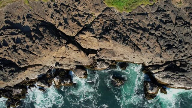 Waves Crashing against the Cliffs along the Oregon Coast. Angry Seas. Drone Aerial View. Video 002