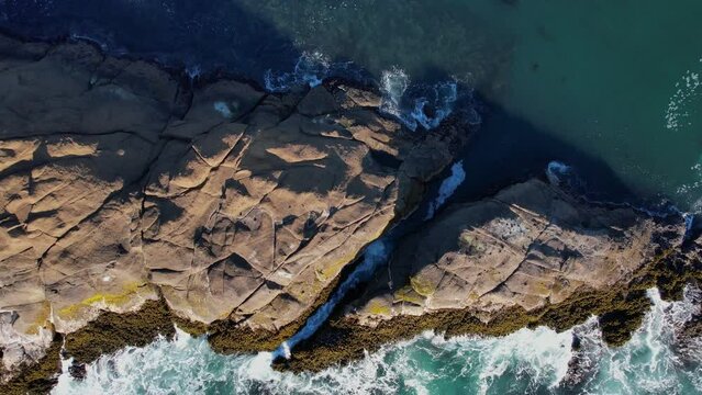 Waves Crashing against the Cliffs along the Oregon Coast. Angry Seas. Drone Aerial View. Video 008