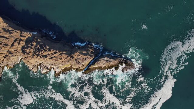 Waves Crashing against the Cliffs along the Oregon Coast. Angry Seas. Drone Aerial View. Video 012