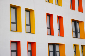 Fototapeta premium Close up of colorful buildings with modern window 