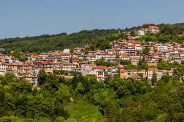 Fototapeta na wymiar Houses on a slope in Veliko Tarnovo town, Bulgaria