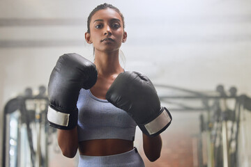 Fitness, gym or portrait of girl boxer in training, exercise or workout with a warrior mindset or...