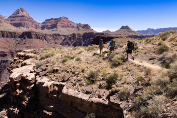 Fototapeta premium Hikers on the Grandview Trail amongst rugged Grand Canyon Scenery