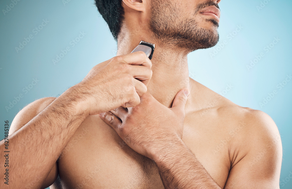 Poster hands, shaving and electric razor with a man in studio on a blue background for personal hygiene or 