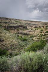 View of river valley and rocky canyon in dry desert terrain near Twin Falls Idaho