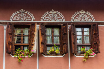 Fototapeta na wymiar Wooden windows of an old house in Plovdiv, Bulgaria