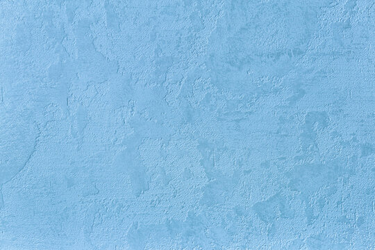 Texture of natural travertine for walls and floor, blue abstract relief background of stone polished surface.