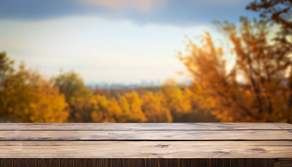 Naklejka na ściany i meble The empty wooden table top with blur background of nature skyline in autumn.