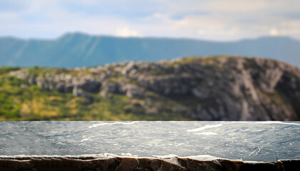 Stone table top on blur mountains background. Nature concepts. For montage product display or design key visual layout.