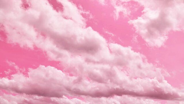 pink clouds timelapse video.pink sky background. Pale pink clouds in a bright pink sky.Heaven background. fantasy nature background. 4k footage