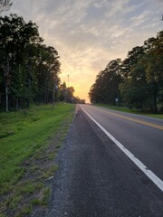 Fototapeta premium View while Walking down Highway 270, Mt. Ida, Arkansas at Sunset