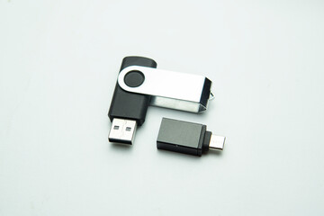 USB OTG Type C adapter and USB flash drive isolated on white background