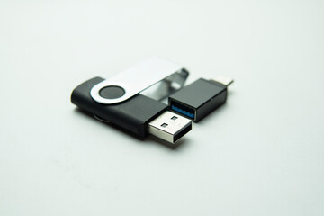 USB OTG Type C adapter and USB flash drive isolated on white background