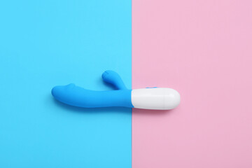 Vibrator on pink and blue background