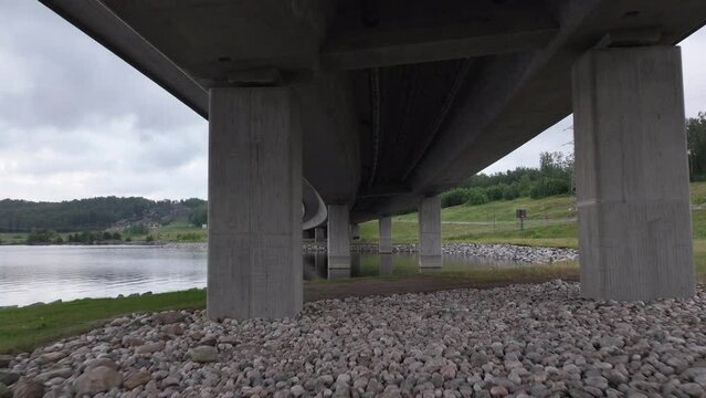 Flying Under Farrisbrua Bridge In Larvik, Norway - drone shot
