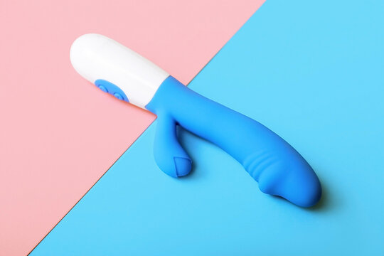 Vibrator on pink and blue background