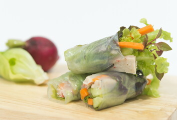Salad roll with side dishes isolated on white background, salad of fresh vegetables rolls.