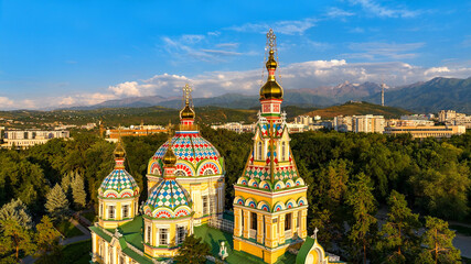 Fototapeta na wymiar Quadcopter view of the Orthodox wooden Ascension Cathedral built in 1907 in the Kazakh city of Almaty on a summer evening