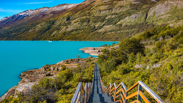 El Calafate, Argentina - Lago Argentino and walking path, near Perito Moreno glacier in Patagonia with blue sky and turquoise water, South America,in Autumn colors