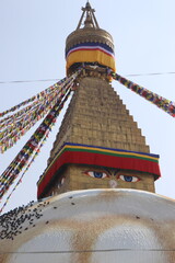 A religious shrine in Kathmandu, Stupa with colorful prayer flags in Swayambhunath Templel, great Buddhist place.