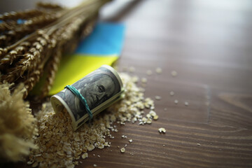 The concept of the cost of grain. 5000 ruble banknotes around a handful of ground grain. World hunger.