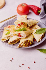 Vegetarian Southwest Egg Rolls combination of corn, black beans, red bell peppers, jalapenos with sweet and spicy seasoning in an egg roll wrapper. Alternative food.