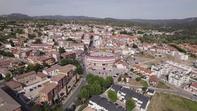 Aerial view circling Spanish Plaza de Toros bullring in the scenic San Martín de Valdeiglesias municipality