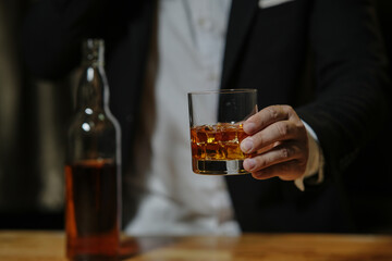 Barman pouring whiskey whiskey glass beautiful night