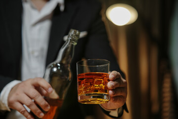 Barman pouring whiskey whiskey glass beautiful night