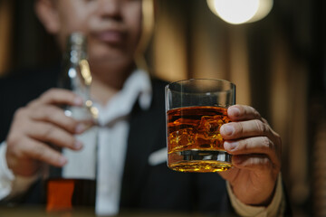 Barman pouring whiskey whiskey glass beautiful night