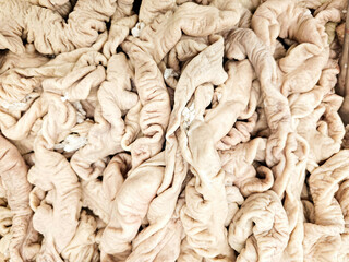 Pile of Fresh Pig Large Intestine in a supermarket, Raw Pork Large Intestine. Many raw Pork bung.
