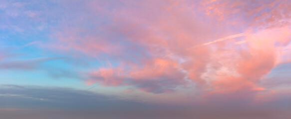 Romantic pink clouds in the dawn sky. Tender mood Sunrise Sundown Sunset sky panorama - 627573734