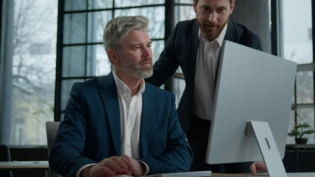 Caucasian man businessman tell colleague business partner great news happy employees happy with good deal career advance salary growth commercial special offer businessmen celebrate victory in office